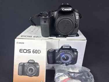 Canon 60D Digital SLR Camera Body w Battery No battery charger. Includes original box. Powers on