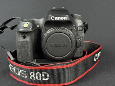 Canon 80D Digital SLR Camera Body w Battery No battery charger. Powers on otherwise untested.
