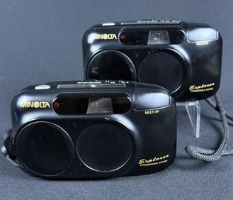 Pair Minolta Explorer Freedom Zoom Film Camera Good cosmetic condition. Untested. No battery