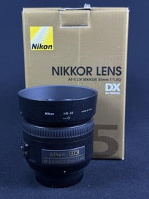 Nikon AF-S DX NIKKOR 35mm f/1.8G Lens With caps, bag, hood and original box. Untested. 6.5 x 4.5 x