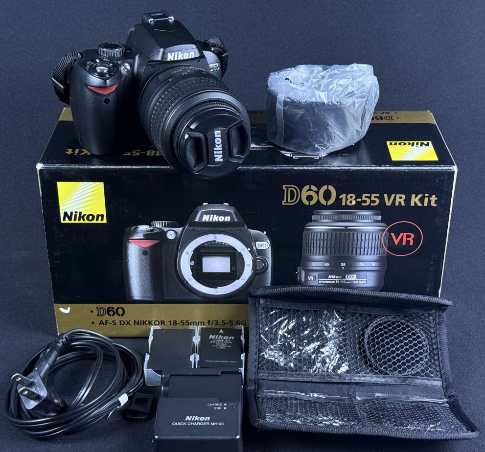 Nikon D60 18-55 VR Kit Digital SLR Camera & Bag With original box. Powers on otherwise untested.: With original box. Powers on otherwise untested. Shutter count unknown. Includes 3 batteries and charger. 4 lens filters also included.13 x 12 x 7 inches total.