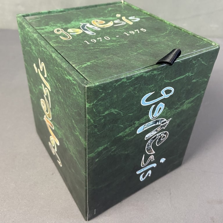 Genesis 1970-1975 CD Box Set Box set of five albums on CD by the band Genesis from 1970-1975. Each: Box set of five albums on CD by the band Genesis from 1970-1975. Each album has two compact discs each. CDs sold untested.