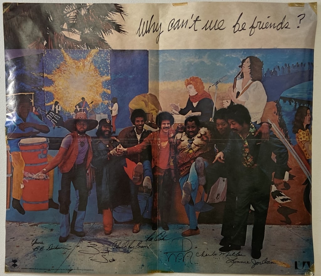 War Why Can't We Be Friends Promotional Poster Poster for the 1975 album Why Can't We Be Friends by: Poster for the 1975 album Why Can't We Be Friends by War. Printed by Far Out Productions. Poster is 23 X 20 inches in size. Folds and creasing, tape residue in corners and middle.