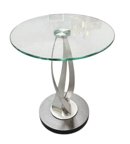 Round Glass Top Table with Twisted Metal Base Table measures 17.5" in diameter and 21"
