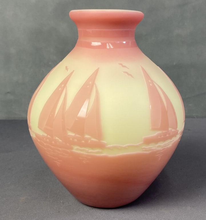 Fenton Sunset Sails Uranium Glass Vase Pink & uranium glass vase featuring sailboats and seagulls.: Pink & uranium glass vase featuring sailboats and seagulls. Fenton sticker on the top, bottom marked Sunset Sails with embossed F mark, numbered 55/350 and signed Kelsey Brian Kemp. Vase is 8 inches t
