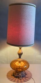 Mid Century Amber Glass & Brass Table Lamp Large table lamp with brass base topped with an amber