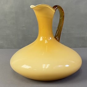 Mid Century Butterscotch Cased Glass Pitcher Pitcher or ewer with butterscotch body and amber glass