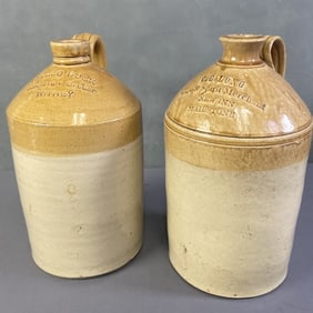Antique Pottery Wine Jugs Set of Two Two glazed pottery wine jugs, missing corks. One is marked CG
