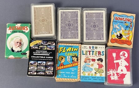 Vintage Card Games Set of Nine Nine decks of playing cards including Disney, Police Troopers, and