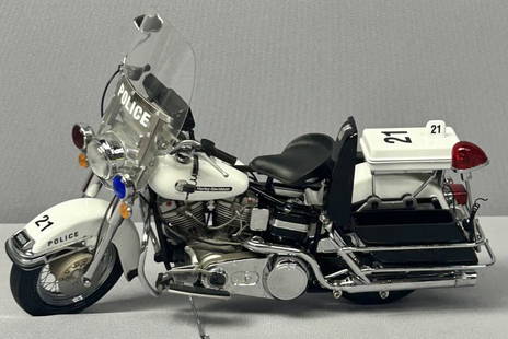Harley Davidson Police Motorcycle Diecast Model Franklin Mint 1:10 scale die-cast model of a: Franklin Mint 1:10 scale die-cast model of a Harley-Davidson Panhead Police Motorcycle.