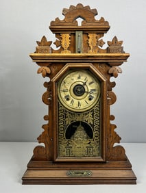 Antique Wooden Mantle Clock & Key Antique mantle clock with clock key. In working condition but does