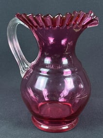Vintage Cranberry Art Glass Ruffled Rim Pitcher No makers mark. Measures 9.5 x 7 inches. Some