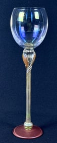 Bri’oni Iridescent Stemmed Wine Glass Measures 12 inches tall by 3.5 inches wide. No chips or