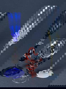 Art Glass Goblet Flute Grouping Pewter and clear glass measures 13 x 3 inches. Blue 11 .5 x 4: Pewter and clear glass measures 13 x 3 inches. Blue 11 .5 x 4 inches. Red and clear 7 x 4 inches.