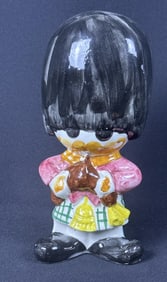 Sal’s Fifth Avenue Ceramic Bagpiper Bank 10.5 inches tall by 5 inches wide. Made in Italy. Please