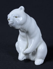 Lladro Porcelain Polar Bear Figurine Measures 4.75 x 4 x 3 inches.  Free from damage.
