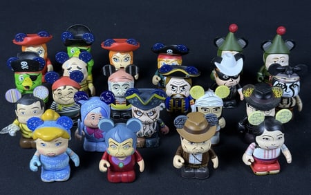 Collection Disney Vynlmation Figures Pirates Cinderella, Indiana Jones, Lone Ranger. 22 in total.