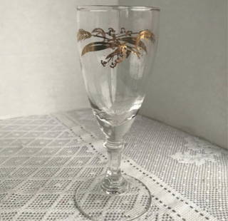 Six Gold Leaf Vintage Cordial Glasses Wheat Vintage glass stemware in a mid century gold wheat: Vintage glass stemware in a mid century gold wheat pattern. Six glasses, clear with gold decoration. Pretty clear cordial glasses with gold wheat pattern. These glasses are in excellent vintage condit