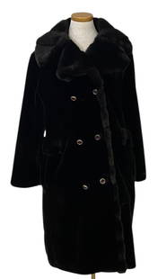 Vintage Faux Fur Coat Cloud 9 Collins & Aikman Dark brown faux fur coat from the 1960's. Label reads: Dark brown faux fur coat from the 1960's. Label reads Cloud 9 Another Fashion Fabric by Collins & Aikman, 14 1/2. Small tear at bottom right. Measurements lying flat are: Neck: 6 1/2 inches Bust: 20 1
