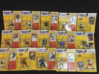 Topps Starting Lineup Hockey Collection 15 unopened figures. Some warping on card backs dented