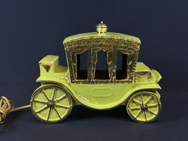 Vintage Ceramic Stagecoach Lamp Green & Gold Works. Crazing and peeling paint present. Please refer
