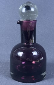 Vintage Red Glass Decanter With Stopper Measures 9 x 5 inches. Unsigned. No cracks or chips in