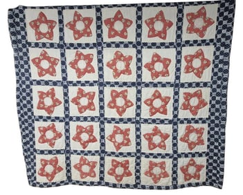 Vintage Handmade Floral Red White & Blue Quilt Measures 66 x 78 inches. Some small stains and wear.
