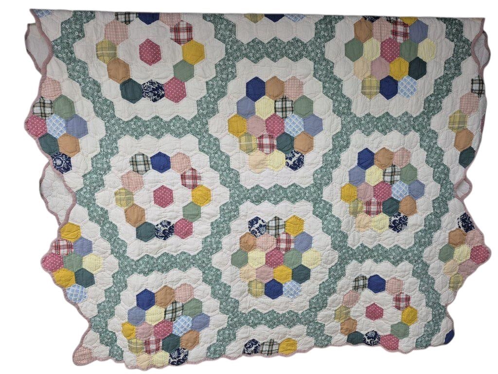 Vintage Grandma’s Flower Garden Quilt Measures 80 x 58 inches. Few small stains. Please see images: Measures 80 x 58 inches. Few small stains. Please see images for details regarding the condition.