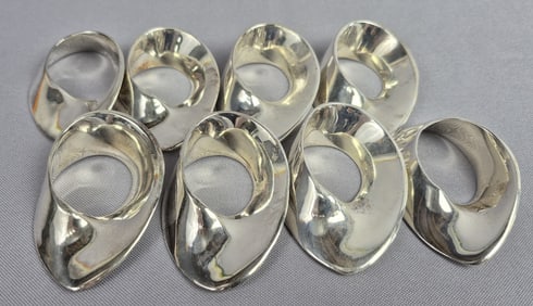 Silver Plate Twist Napkin Rings Set of 8 Please see images for details regarding the condition.