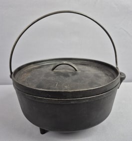 Vintage Cast Iron 10 Inch Dutch Oven with Lid Please see images for details regarding the condition.