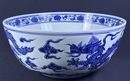 Large Chinese Blue & White Porcelain Dragon Bowl No makers mark. 8 inches tall by 18 inches wide.