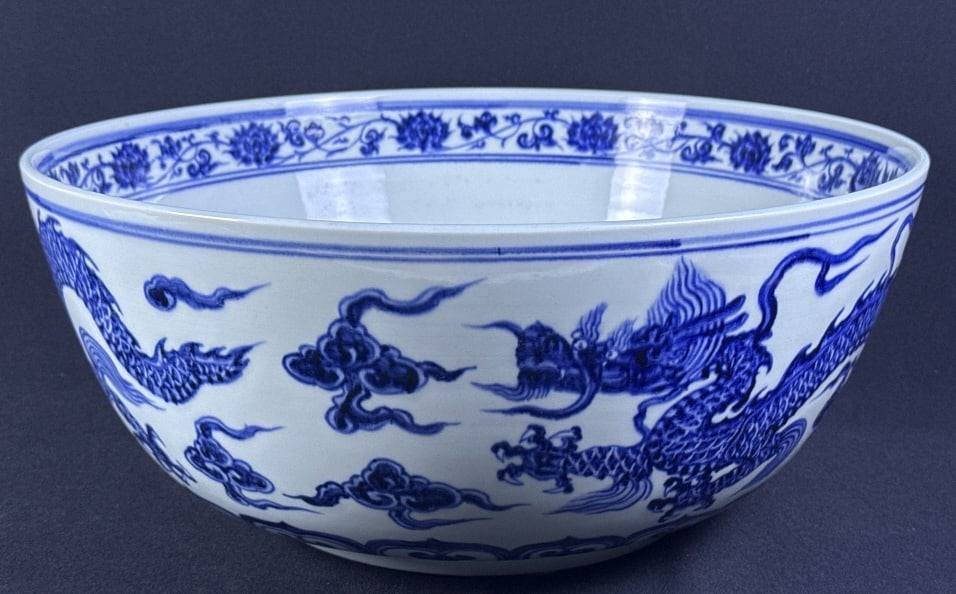 Large Chinese Blue & White Porcelain Dragon Bowl No makers mark. 8 inches tall by 18 inches wide.: No makers mark. 8 inches tall by 18 inches wide. Some scuffs and scratches. Please refer to photos for condition information.