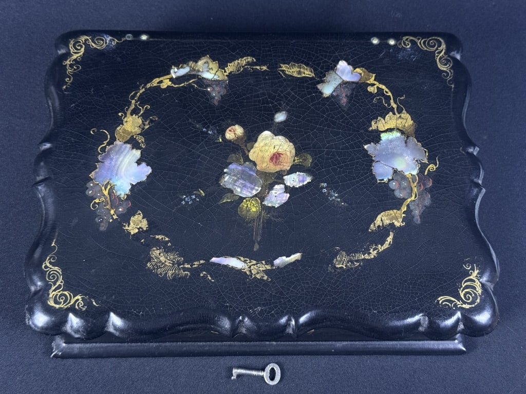 Vintage Black Lacquer & Mother of Pearl Box With key. Key turns lock doesn’t work. Crazing in: With key. Key turns lock doesn’t work. Crazing in lacquer. Measures 9.75 x 8 x 2.5 inches. Please see photo for condition details.
