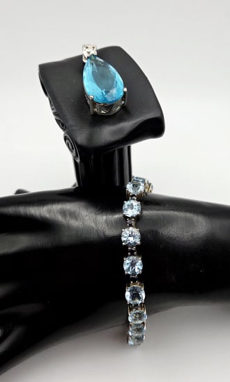 Sterling London Blue Topaz Pendant & Bracelet Pendant Weighs 9.3 Grams: Pendant Weighs 9.3 Grams Bracelet Measures 7.5" Bracelet Weighs 18.8 Grams