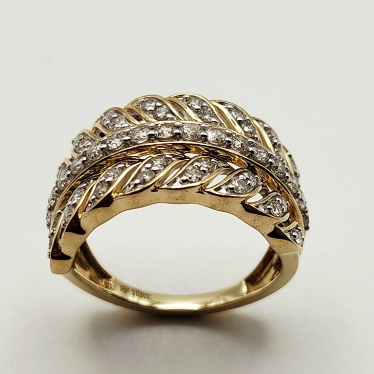 White Diamond 10K Yellow Gold Wide Band Ring Weighs 4.8 grams. Size 7: Weighs 4.8 grams. Size 7