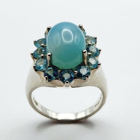 925 Sterling Blue Cabochon Quartz & CZ Ring Ring is size 9. Weighs 9.7 grams.