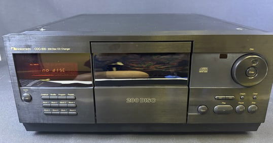 Nakamichi CDC-300 200 Disc CD Changer In working condition with remote. Measures 17 x 18 x 8 inches.