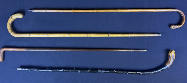 Vintage Wooden & Bamboo Walking Canes Four canes 3 measuring approximately 36 inches long one apple