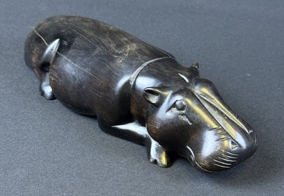 Carved African Ebony Wood Hippopotamus Measures 10.5 x 3.5 x 2.5 inches weighing 2 lbs 5.6 oz.
