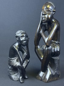 African Tribal Carved Wood Statues Pair Large carving measures 12 x 4 x 3 inches. Smaller measures 8