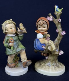 Hummel Figurines Apple Tree Girl Gay Adventure #141 stands 5.75 inches tall. #356 stands 4.5 inches