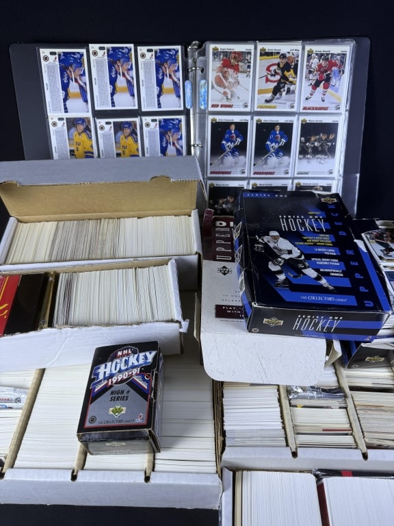 Hockey Card Collection Upper Deck 190-1995 13 x 13 x 16 approximate total lot size. 9 boxes and one: 13 x 13 x 16 approximate total lot size. 9 boxes and one binder.