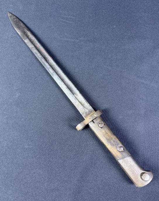 Vintage Bayonet 11.75 inch blade. 17 inches including handle. Marked H OSZ. Tarnish and rust: 11.75 inch blade. 17 inches including handle. Marked H OSZ. Tarnish and rust present. Capital letter A scratched into handle.