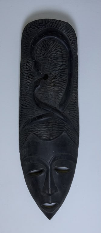 Carved Wood Tribal Mask w Snake Motiff 30 x 9.5 x 3 inches. Unsigned. Origin unknown. Please see: 30 x 9.5 x 3 inches. Unsigned. Origin unknown. Please see photos for item details and condition information.