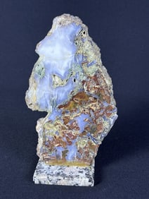 Natural Agate Slice 7 inches tall by 4.5 inches he’s wide. Glued to quartz base.