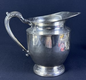 Vintage Silver Mfg. Corp. Silver Plated Pitcher 7.5 inches tall by 10 inches wide at handle. Plated