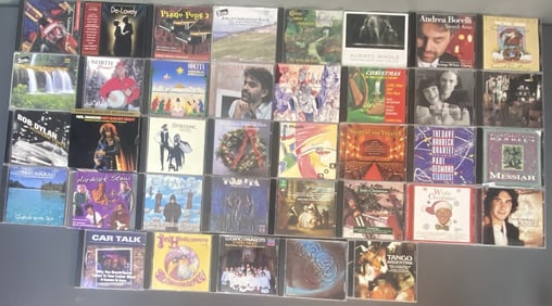 Mystery Lot CDs Bocelli, Fleetwood Mac 37 compact discs from Pink Floyd, Fleetwood Mac, Andrea