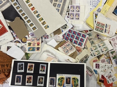 Mixed Mystery Lot Postage Stamp Collection Both used and unused. Approximately 11 x 9 x 4 inches