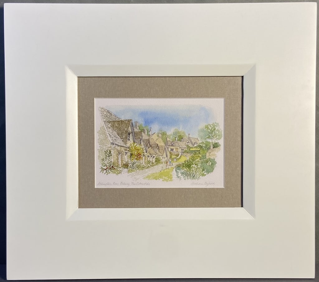 Graham Byfield Arlington Row Watercolor Print Art print of Arlington Road, Bibury by Graham Byfield,: Art print of Arlington Road, Bibury by Graham Byfield, signed in pencil by the artist. Artwork with frame is 18 X 16 inches in size.