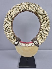 African Tribal Shell Necklace with Stand Necklace measures 11 x 13 inches tall. Free from damage.